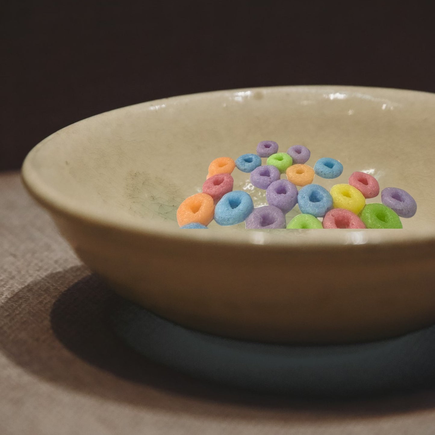 Doodlations Coffee Bar & Boutique Fruit Loop wax melts in pastel orange, blue, purple, yellow, and green.