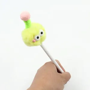 Doodlations Coffee Bar & Boutique fuzzy lime green monster gel pen with a pink antenna and googly eyes