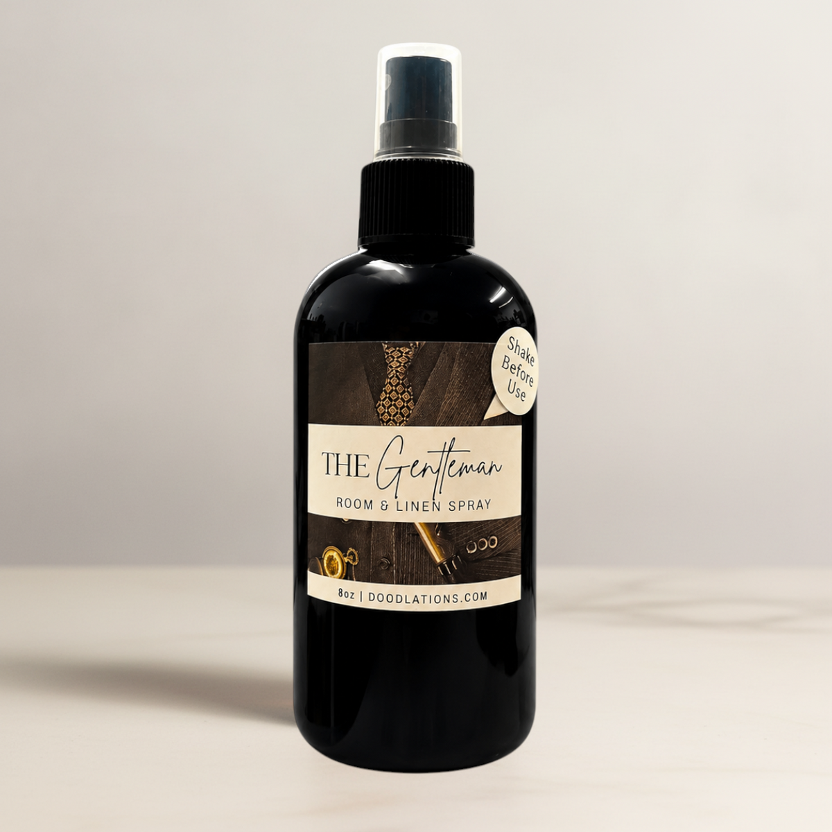 Doodlations Coffee Bar & Boutique The Gentleman room and linen spray in an 8oz black bottle with a masculine label.