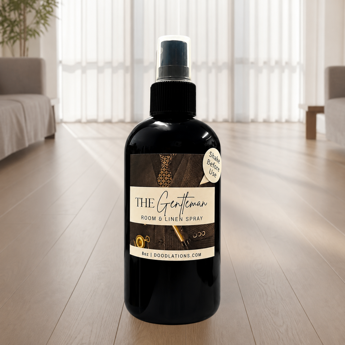 Doodlations Coffee Bar & Boutique The Gentleman room and linen spray in a black 8oz bottle with a sophisticated label.