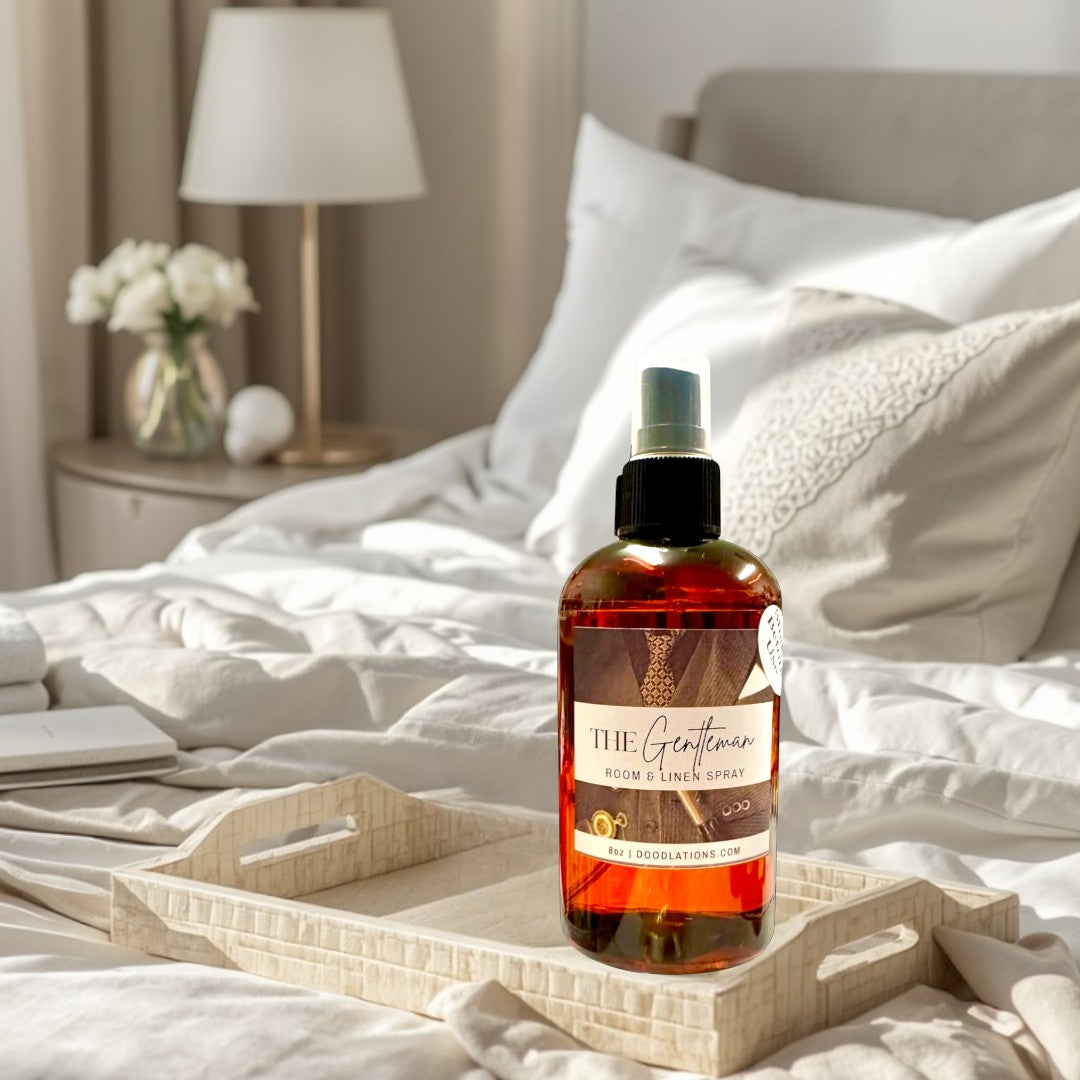 Doodlations Coffee Bar & Boutique The Gentleman Room & Linen Spray with mahogany, blood orange, and bourbon vanilla scents.
