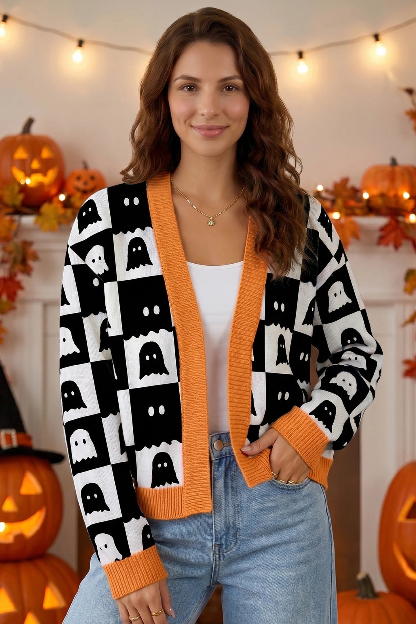 Doodlations Coffee Bar & Boutique black and white geometric ghost print knit cardigan with orange trim