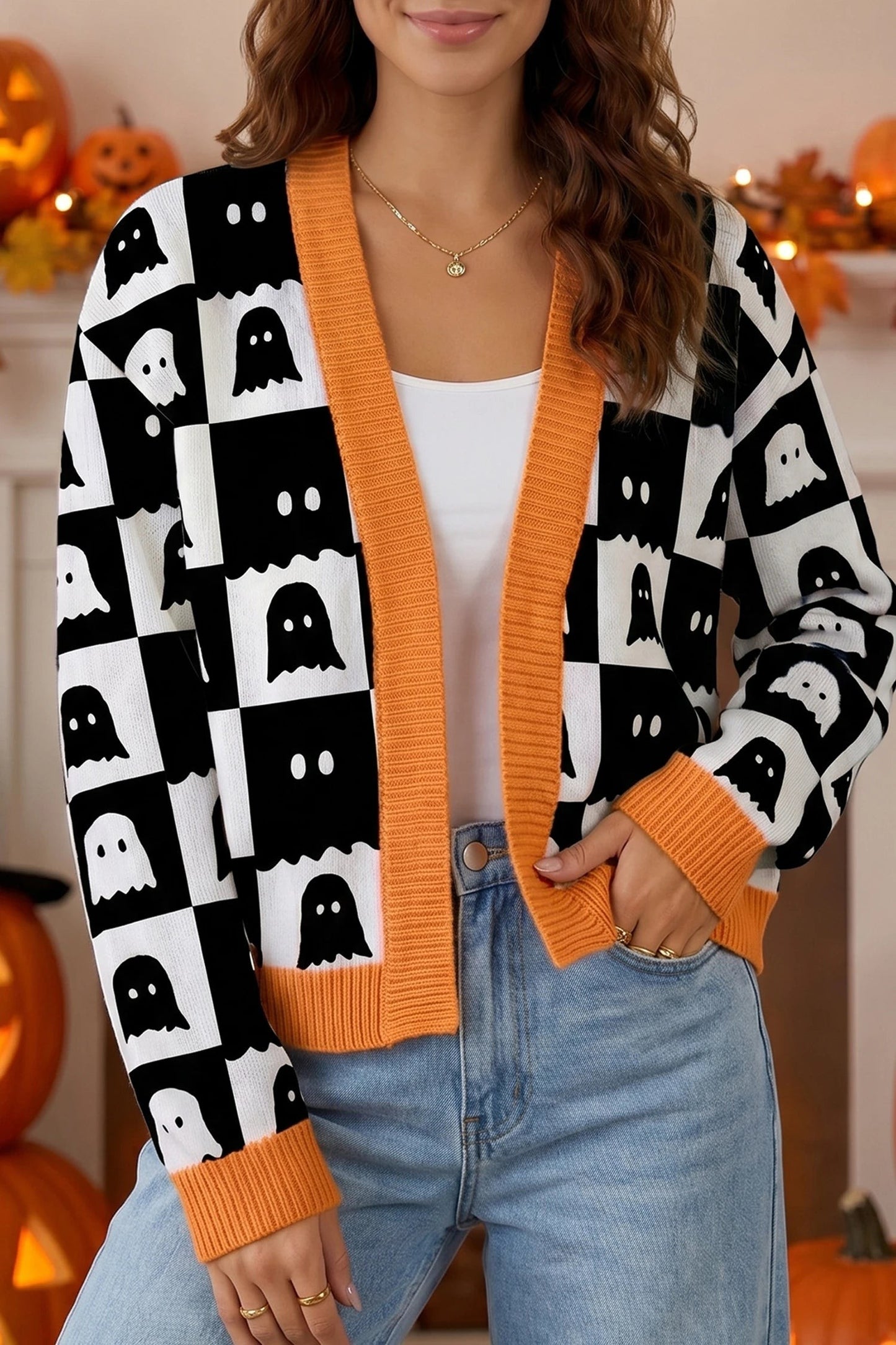 Doodlations Coffee Bar & Boutique black and white geometric ghost print knit cardigan with orange trim