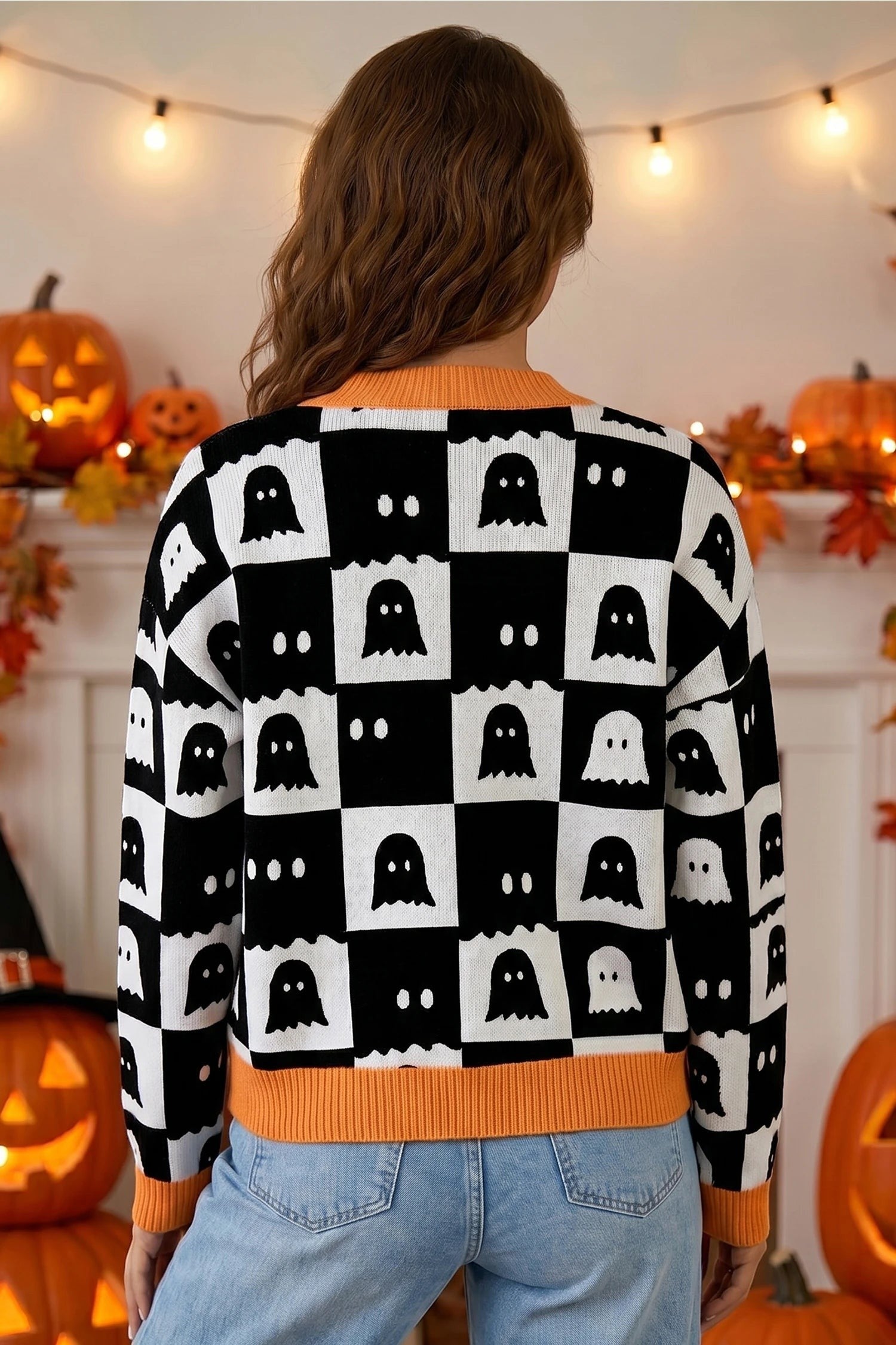 Doodlations Coffee Bar & Boutique black and white geometric ghost print knit cardigan with orange trim