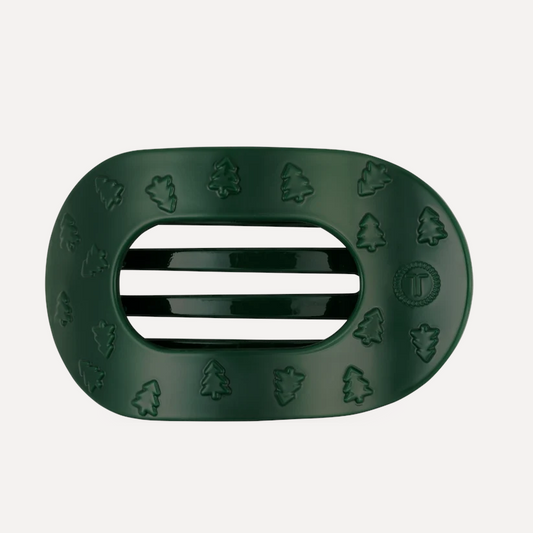 Doodlations Coffee Bar & Boutique Teleties flat round hair clip in dark green with a festive Christmas tree pattern.