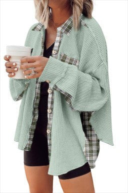 Doodlations Coffee Bar & Boutique grass green waffle knit shacket featuring plaid patchwork panels and button front