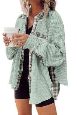 Doodlations Coffee Bar & Boutique grass green waffle knit shacket featuring plaid patchwork and button-front closure.
