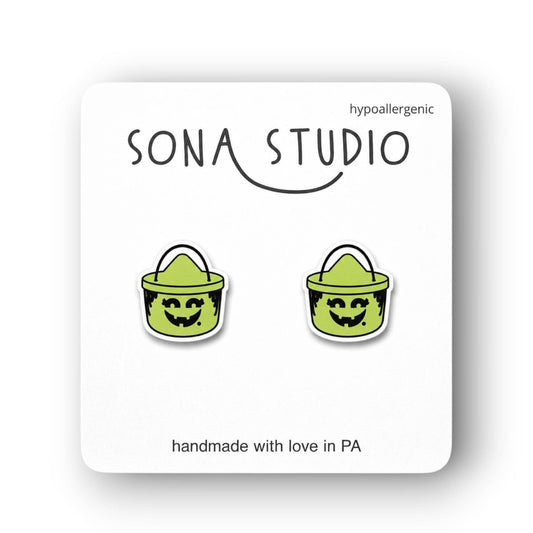 Doodlations Coffee Bar & Boutique retro green Halloween witch bucket stud earrings on a display card