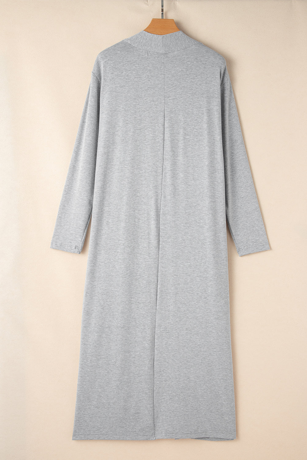 Doodlations Coffee Bar & Boutique grey longline cardigan from a lounge set, back view on a wooden hanger.
