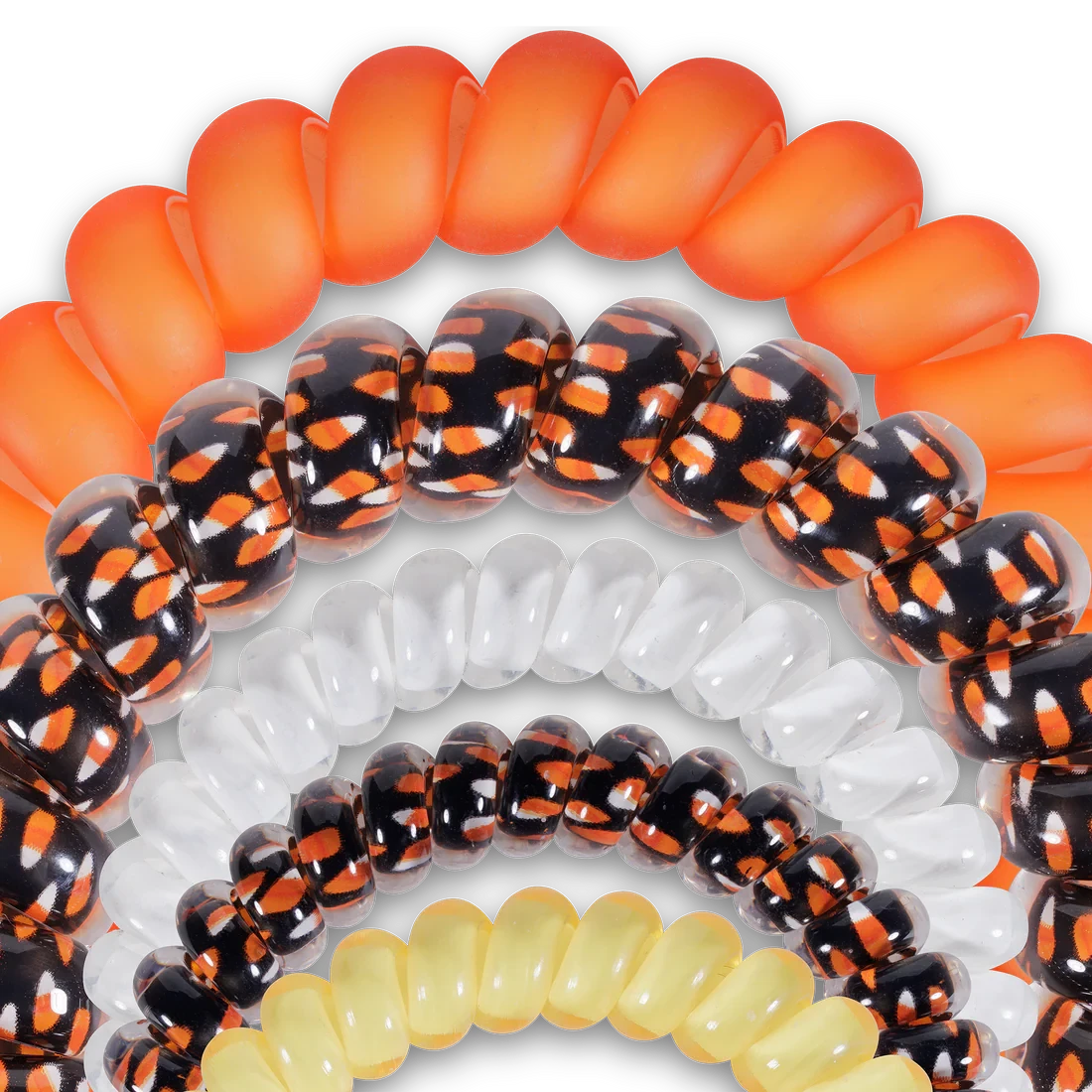 Doodlations Coffee Bar & Boutique Halloween spiral hair ties in orange, white, yellow, and candy corn print patterns.