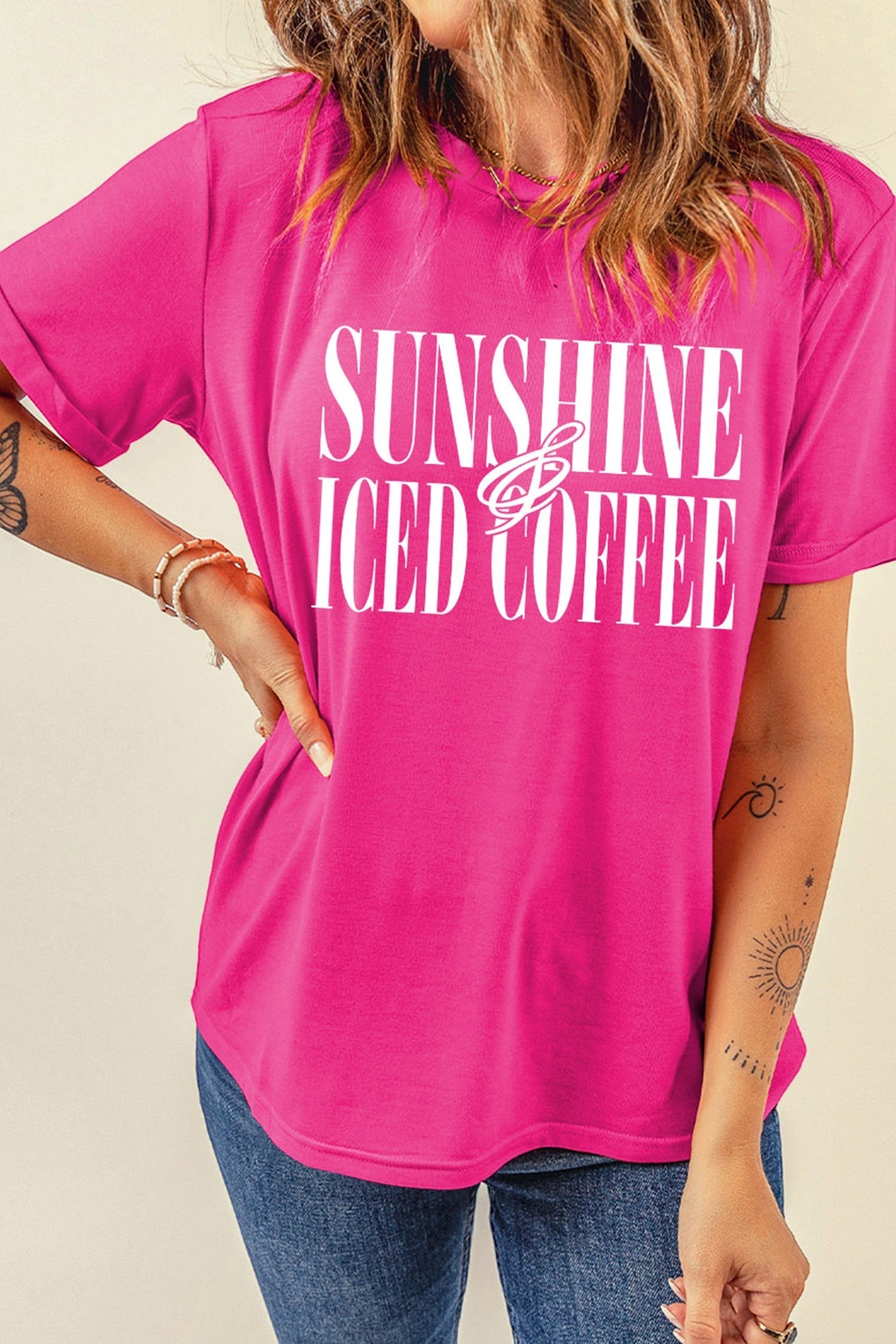 Doodlations Coffee Bar & Boutique hot pink crewneck t-shirt with white Sunshine And Iced Coffee graphic text