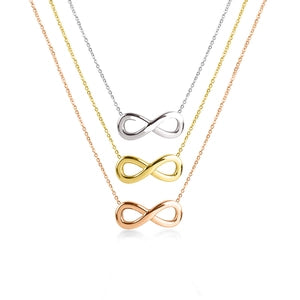 Doodlations Coffee Bar & Boutique infinity symbol pendant necklaces in silver, gold, and rose gold stainless steel.