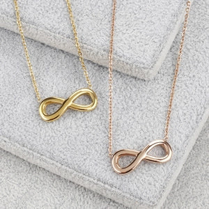 Doodlations Coffee Bar & Boutique gold and rose gold stainless steel infinity symbol pendant necklaces