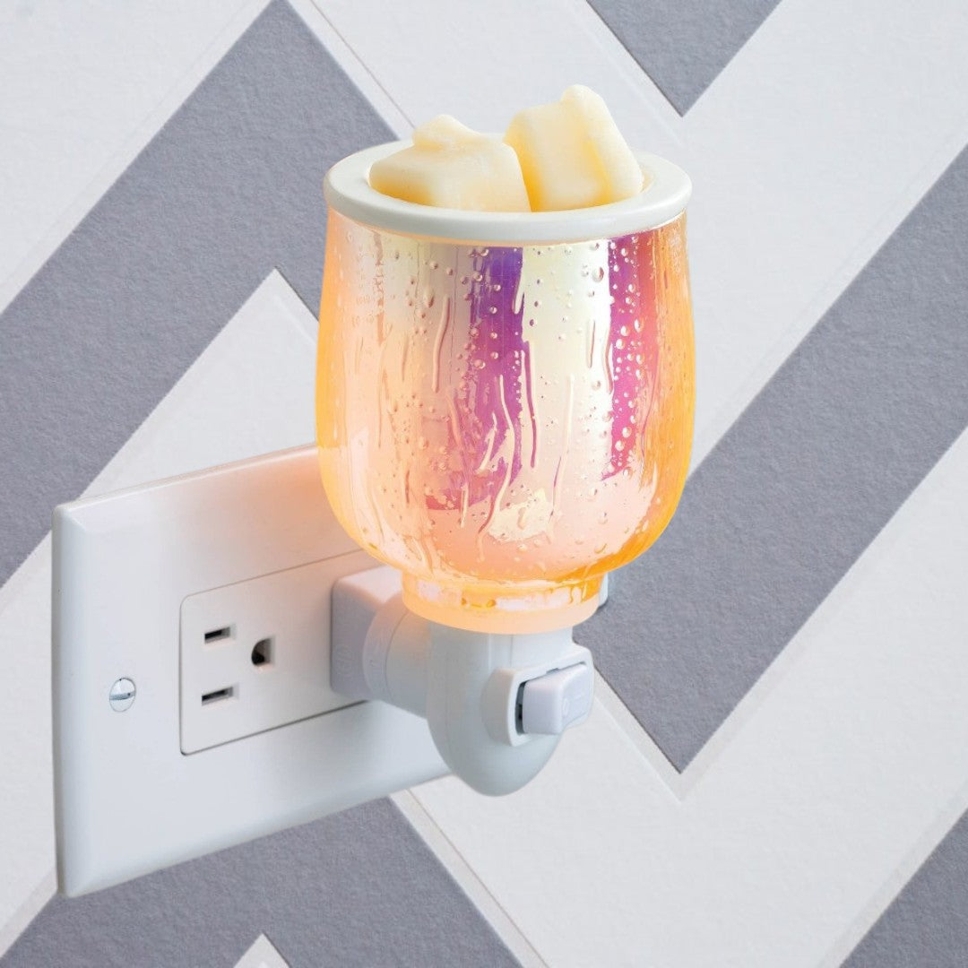 Doodlations Coffee Bar & Boutique iridescent plug-in wax warmer with textured glass and wax melts.