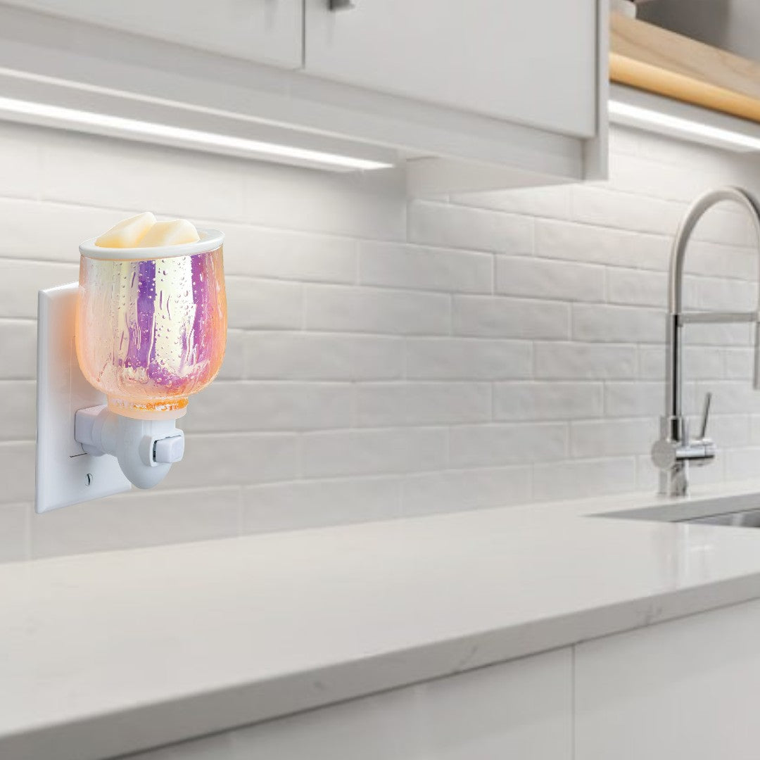 Doodlations Coffee Bar & Boutique iridescent glass plug-in wax warmer with textured surface and wax melts.
