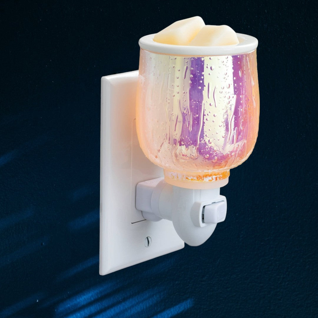 Doodlations Coffee Bar & Boutique iridescent glass plug-in wax warmer with textured surface and wax melts.