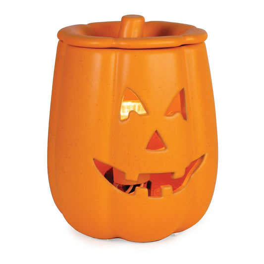 Doodlations Coffee Bar & Boutique orange ceramic Jack o' Lantern electric wax warmer with glowing interior light