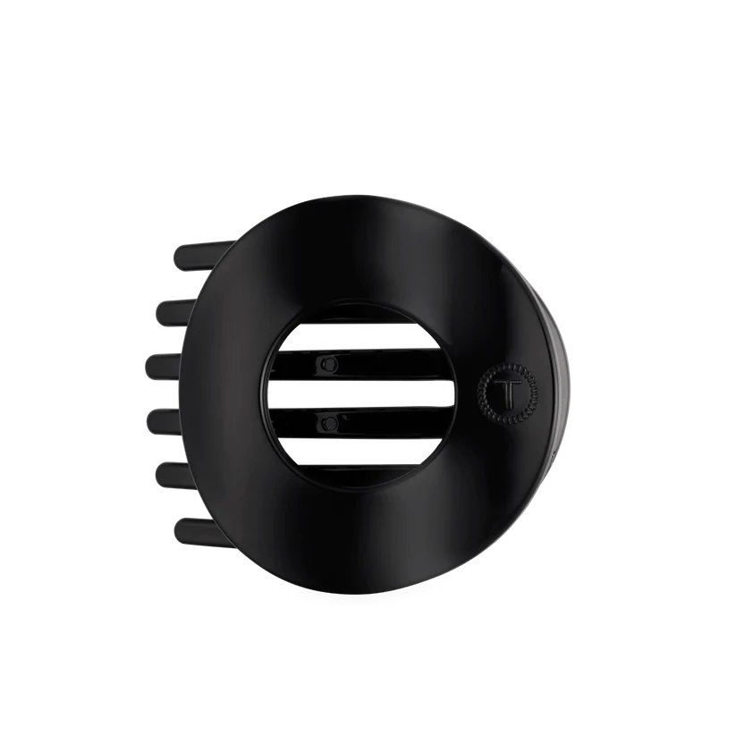 Doodlations Coffee Bar & Boutique Teleties jet black flat circle hair clip with bendable teeth for a secure hold.