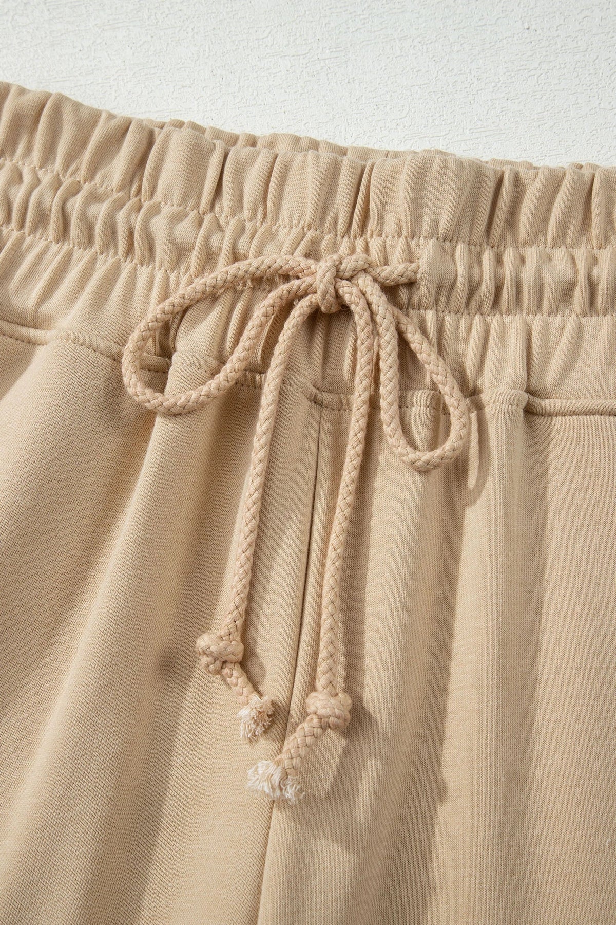 Doodlations Coffee Bar & Boutique khaki drawstring lounge pants with elastic waistband and braided cord detail