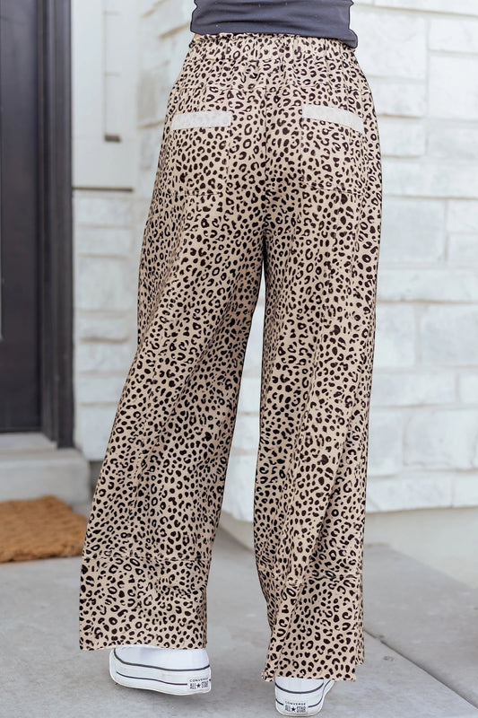 Doodlations Coffee Bar & Boutique khaki leopard print wide leg pants with back pockets and a relaxed fit