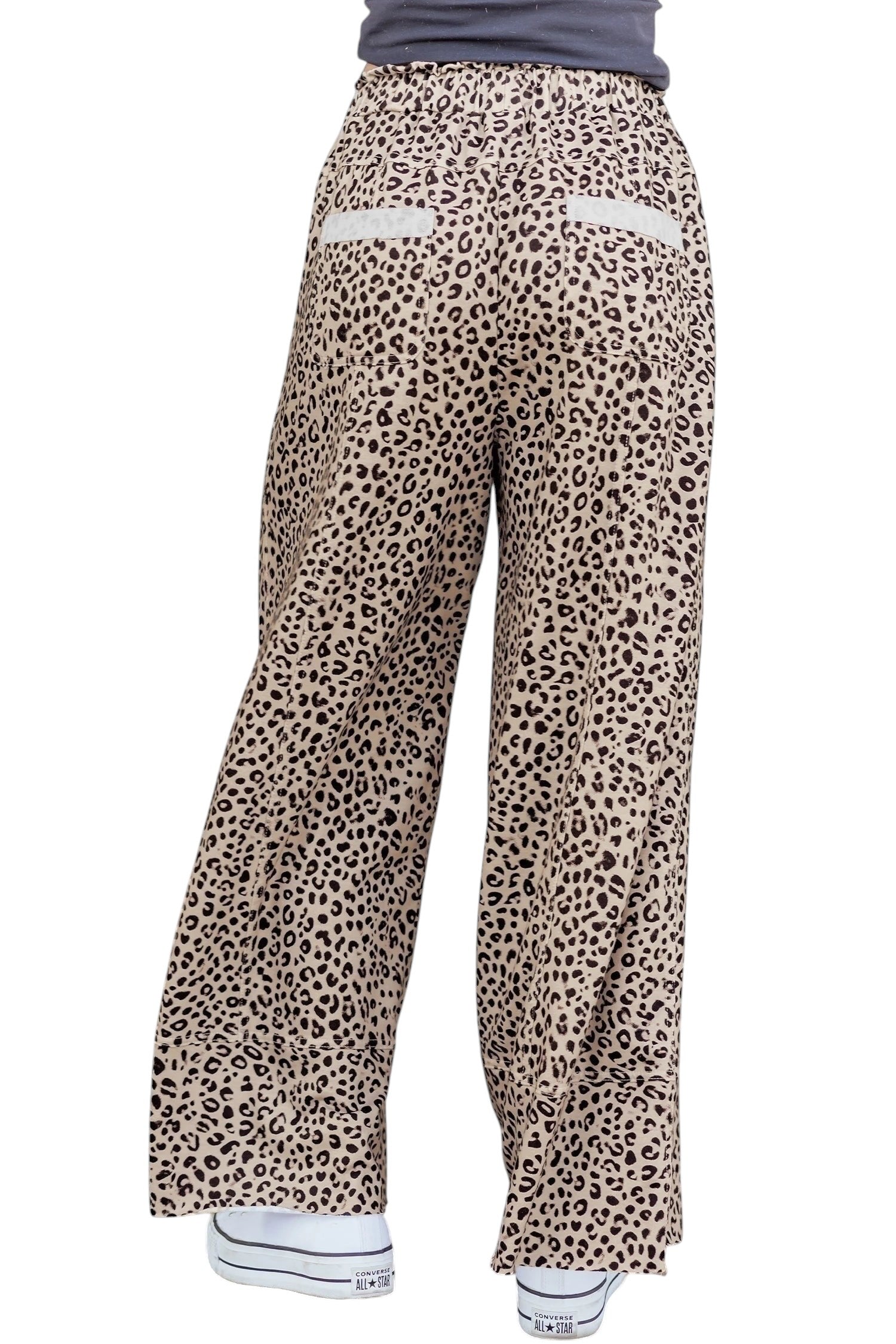 Doodlations Coffee Bar & Boutique khaki leopard print wide leg pants with a relaxed fit and back pockets.