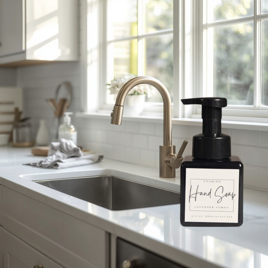 Doodlations Coffee Bar & Boutique Lavender & Lemon foaming hand soap in a black square bottle with a black pump.