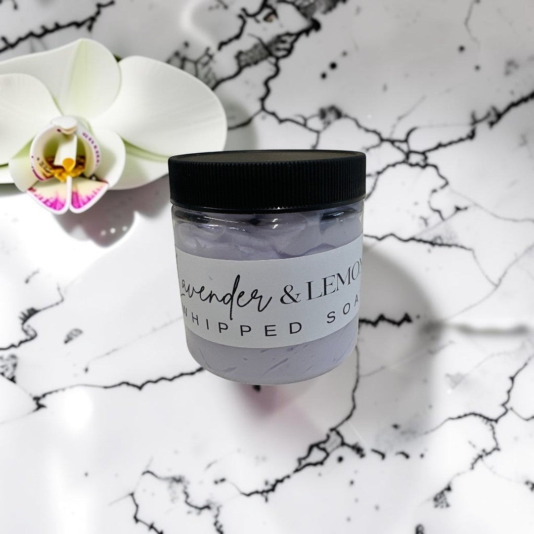 Doodlations Coffee Bar & Boutique lavender and lemon whipped soap in a 4oz jar with a black lid.