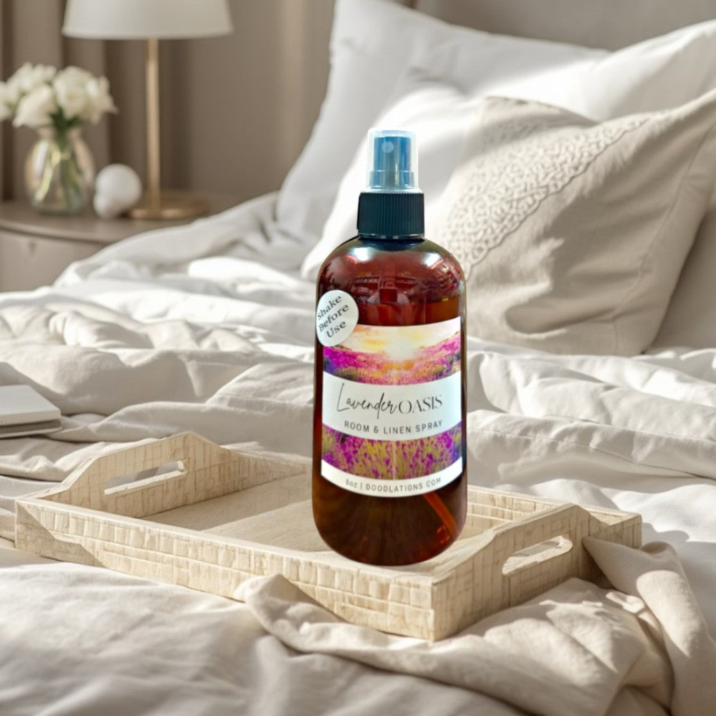 Doodlations Coffee Bar & Boutique Lavender Oasis Room & Linen Spray bottle with a scenic label of a lavender field at sunset.