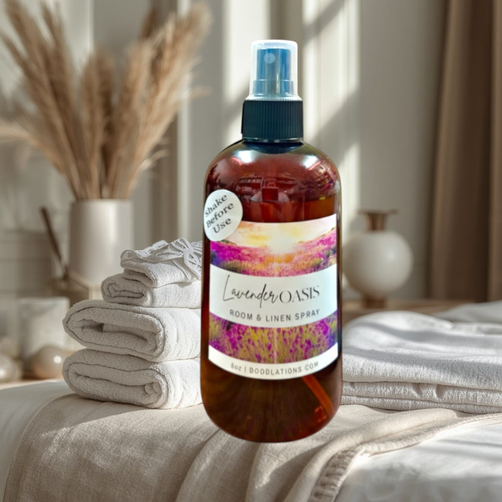Doodlations Coffee Bar & Boutique Lavender Oasis Room & Linen Spray in amber bottle with scenic label.