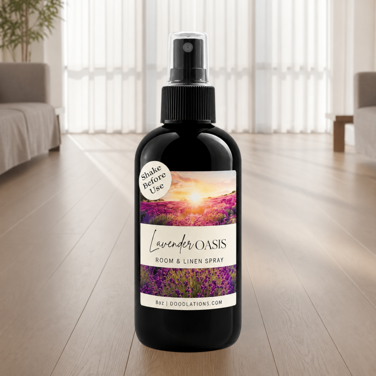 Doodlations Coffee Bar & Boutique Lavender Oasis room and linen spray in a black bottle with a sunset lavender label.