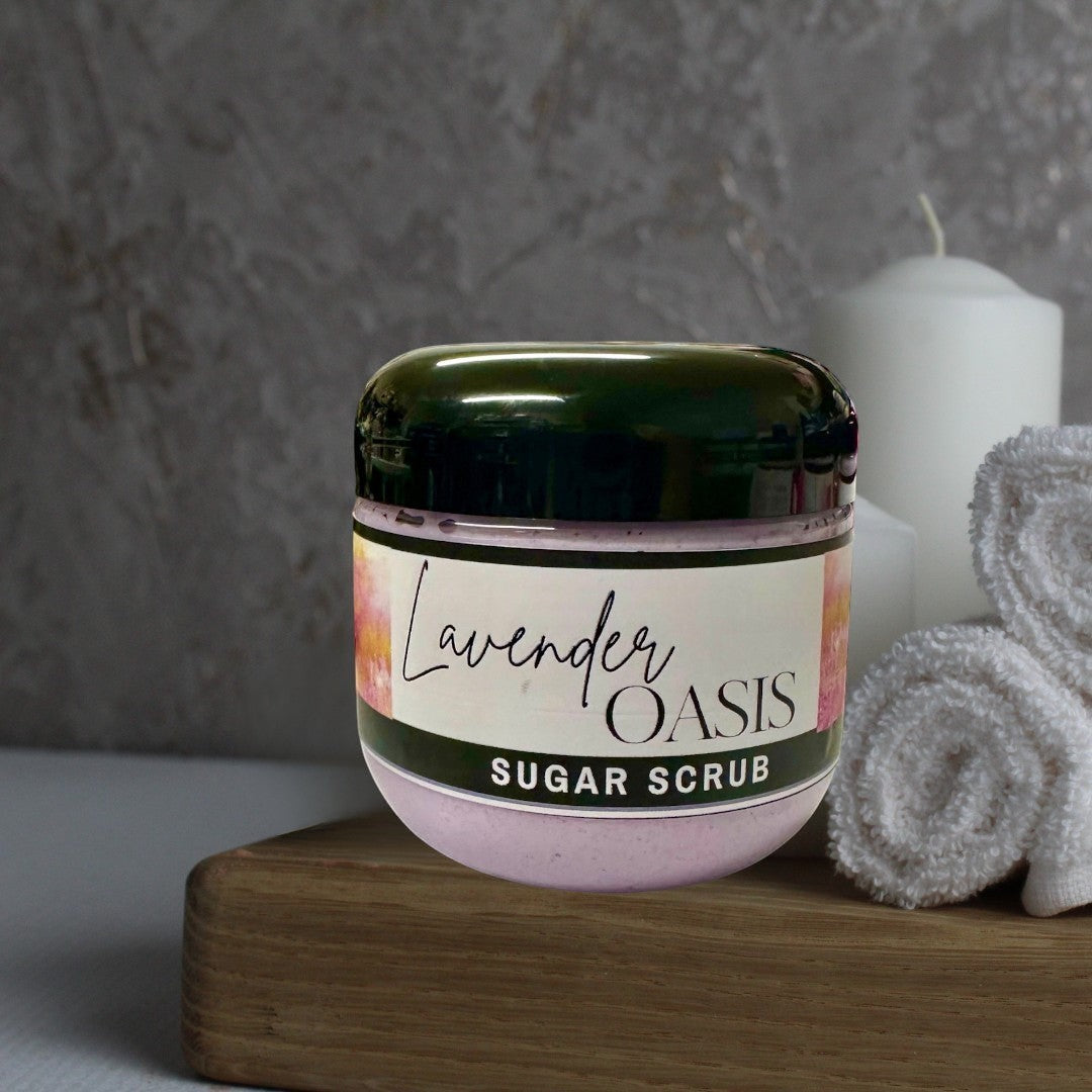 Doodlations Coffee Bar & Boutique Lavender Oasis Sugar Scrub, a 4oz jar of pale purple exfoliating scrub with a soothing lavender scent.