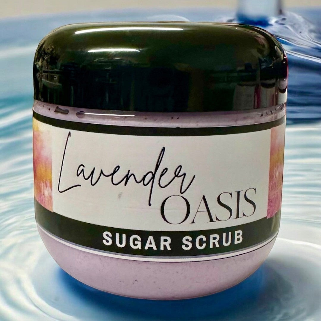 Doodlations Coffee Bar & Boutique Lavender Oasis Sugar Scrub, a 4oz jar of pale purple exfoliating scrub with a soothing lavender scent.