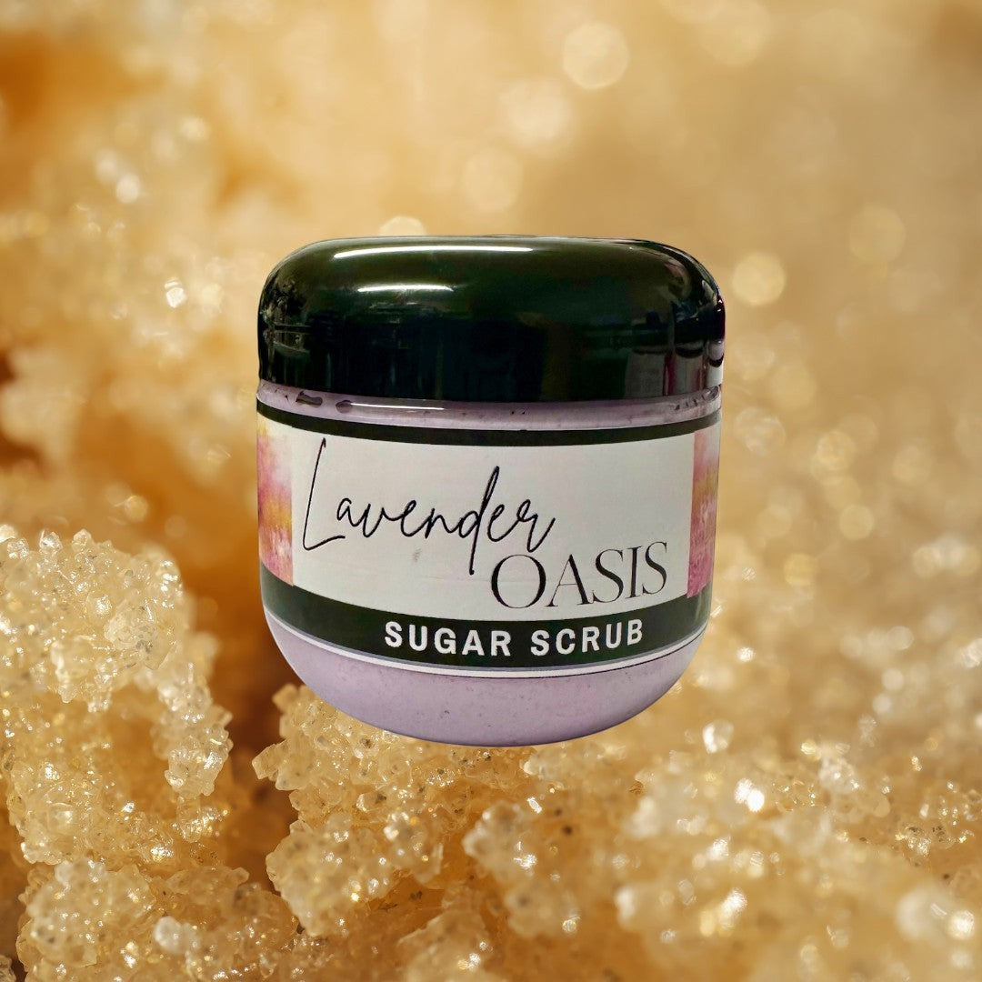 Doodlations Coffee Bar & Boutique Lavender Oasis Sugar Scrub in a clear jar with a black lid. The scrub is light purple.