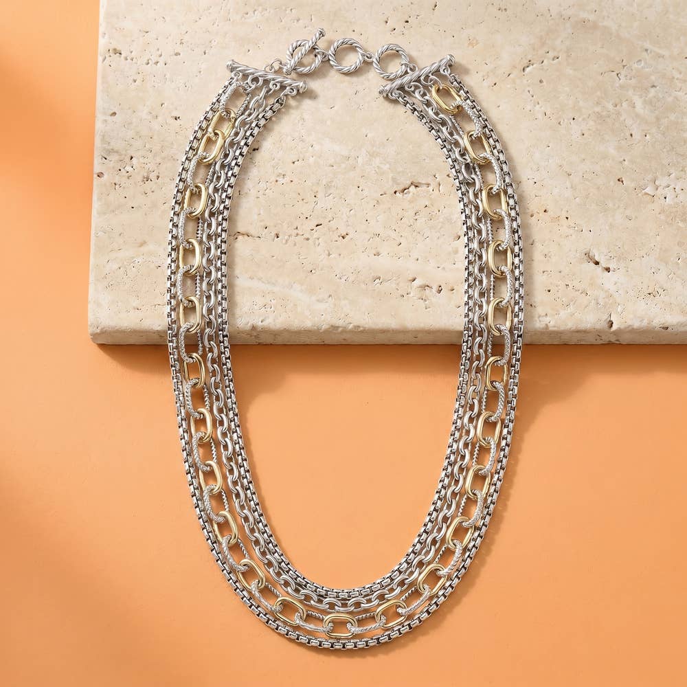 Doodlations Coffee Bar & Boutique layered mixed-metal chain necklace with silver and gold-tone links and toggle clasp.