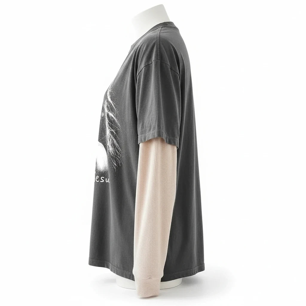 Doodlations Coffee Bar & Boutique charcoal grey graphic t-shirt with beige waffle-knit long sleeves on a mannequin