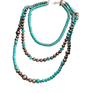 Doodlations Coffee Bar & Boutique layered statement necklace with turquoise beads and metallic accents