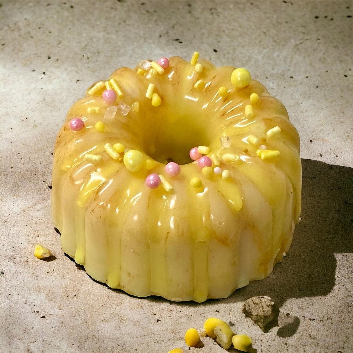 Doodlations Coffee Bar & Boutique yellow bundt cake wax melt with yellow and pink sprinkles and glaze