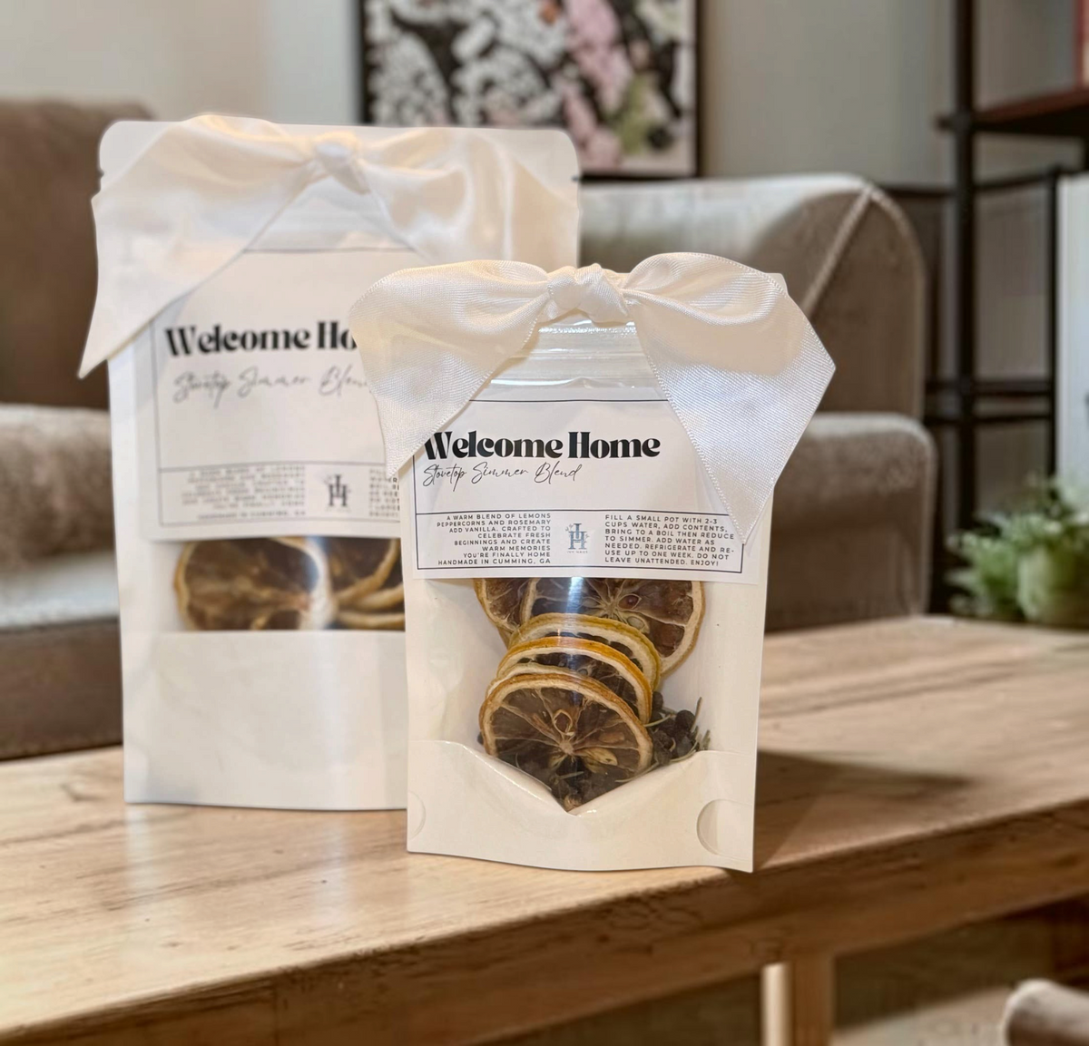 Doodlations Coffee Bar & Boutique Welcome Home lemon stovetop simmer blend potpourri in white bags with white bows.