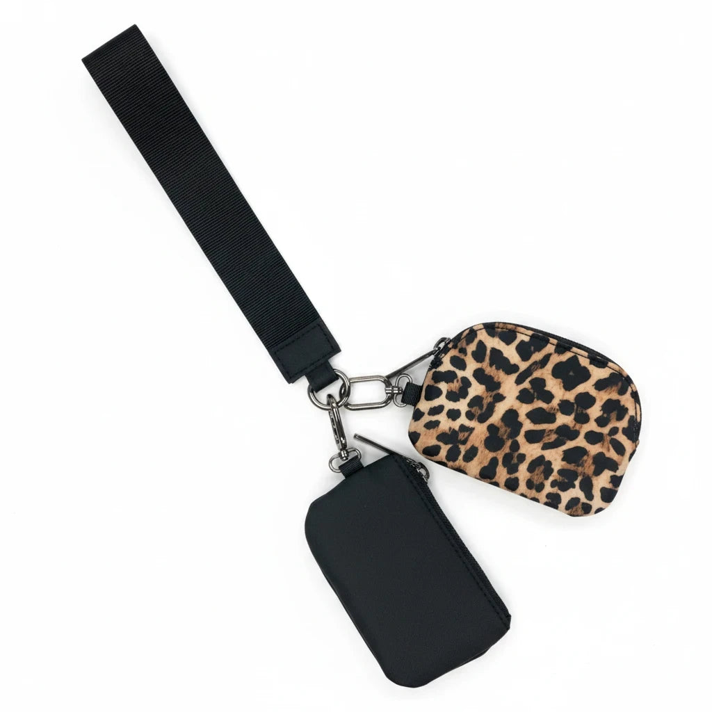 Doodlations Coffee Bar & Boutique Lulu Mac double pouch wristlet featuring a black pouch and a leopard print pouch.