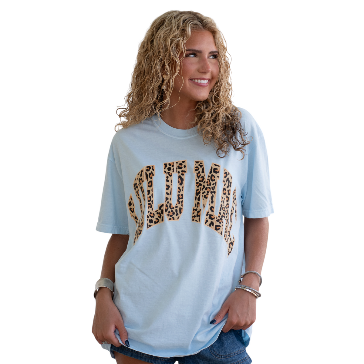 Doodlations Coffee Bar & Boutique light blue crew-neck tee with Lulu Mac leopard print lettering on a blonde model
