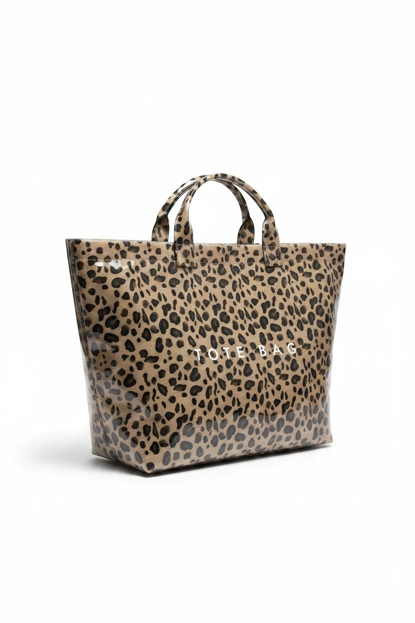 Doodlations Coffee Bar & Boutique leopard print tote bag with a glossy PVC finish and spacious interior.