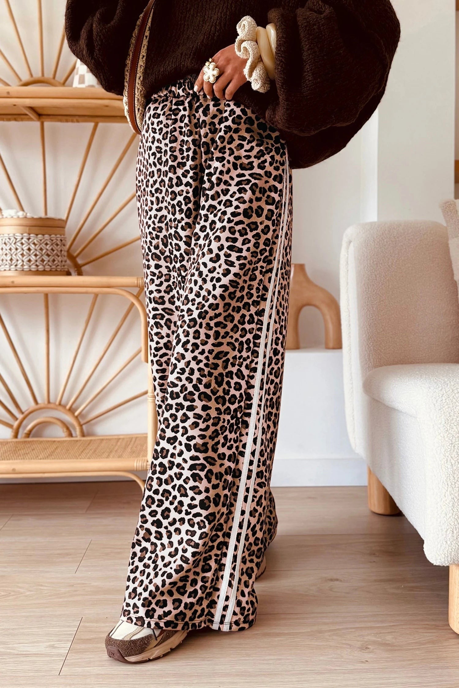 Doodlations Coffee Bar & Boutique wide leg pants in beige leopard print with white side stripes and elastic waist
