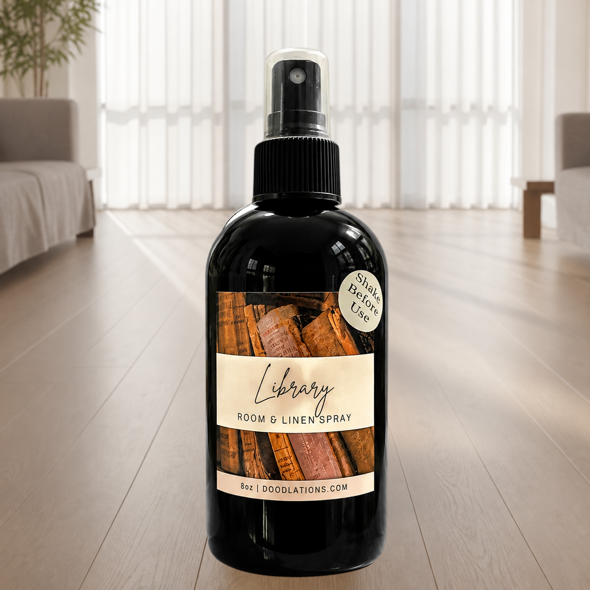 Doodlations Coffee Bar & Boutique Library room and linen spray in a black bottle with a vintage book label
