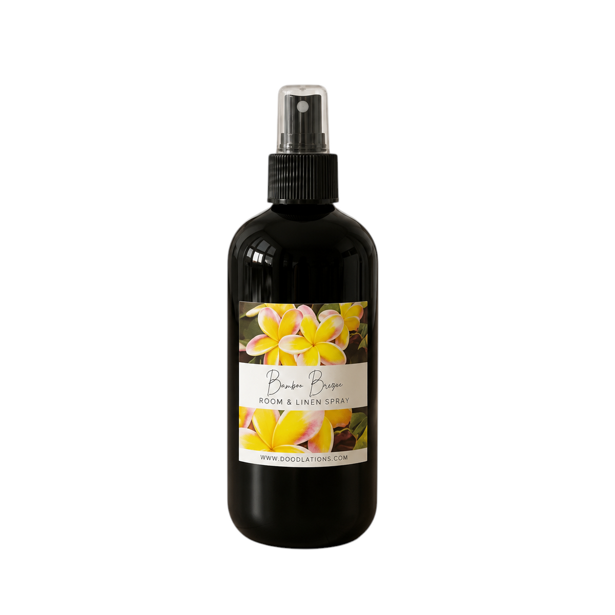 Doodlations Coffee Bar & Boutique Bum Bum room and linen spray in a black bottle with a tropical floral label