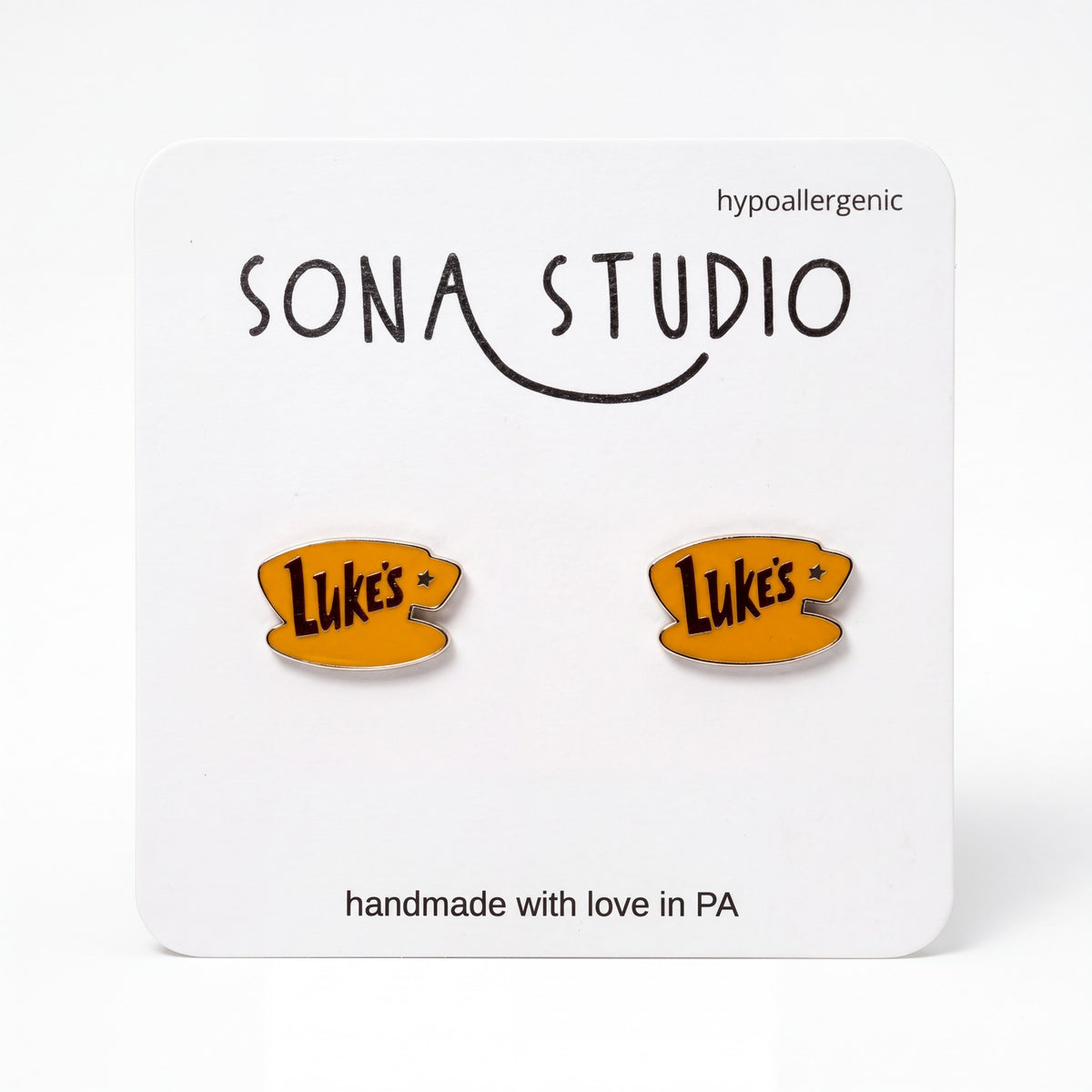 Doodlations Coffee Bar & Boutique Luke's Diner earrings featuring yellow coffee cup designs on hypoallergenic posts.