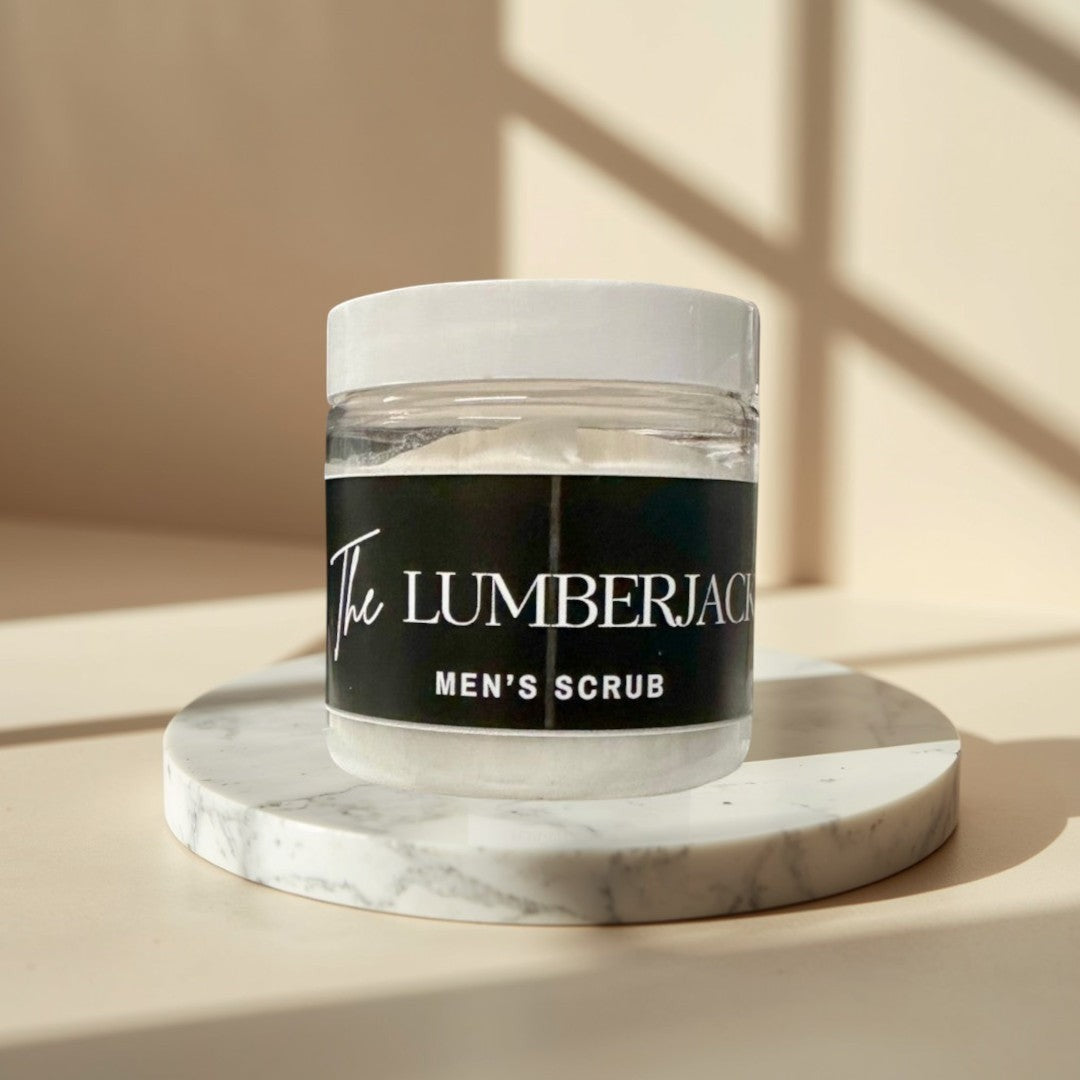 Doodlations Coffee Bar & Boutique The Lumberjack Men's Scrub in clear jars with white lids and black labels.