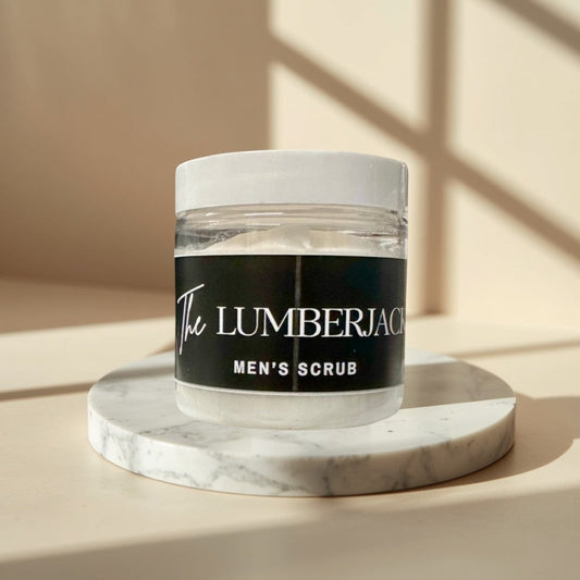 Doodlations Coffee Bar & Boutique The Lumberjack Men's Scrub in clear jars with white lids and black labels.