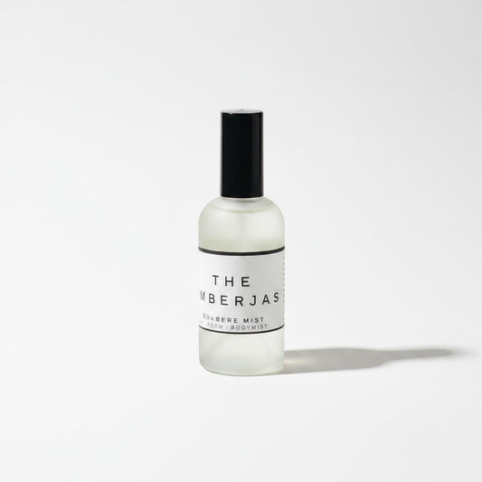 Doodlations Coffee Bar & Boutique The Lumberjack luxury fine mist perfume in a clear glass bottle with black cap.