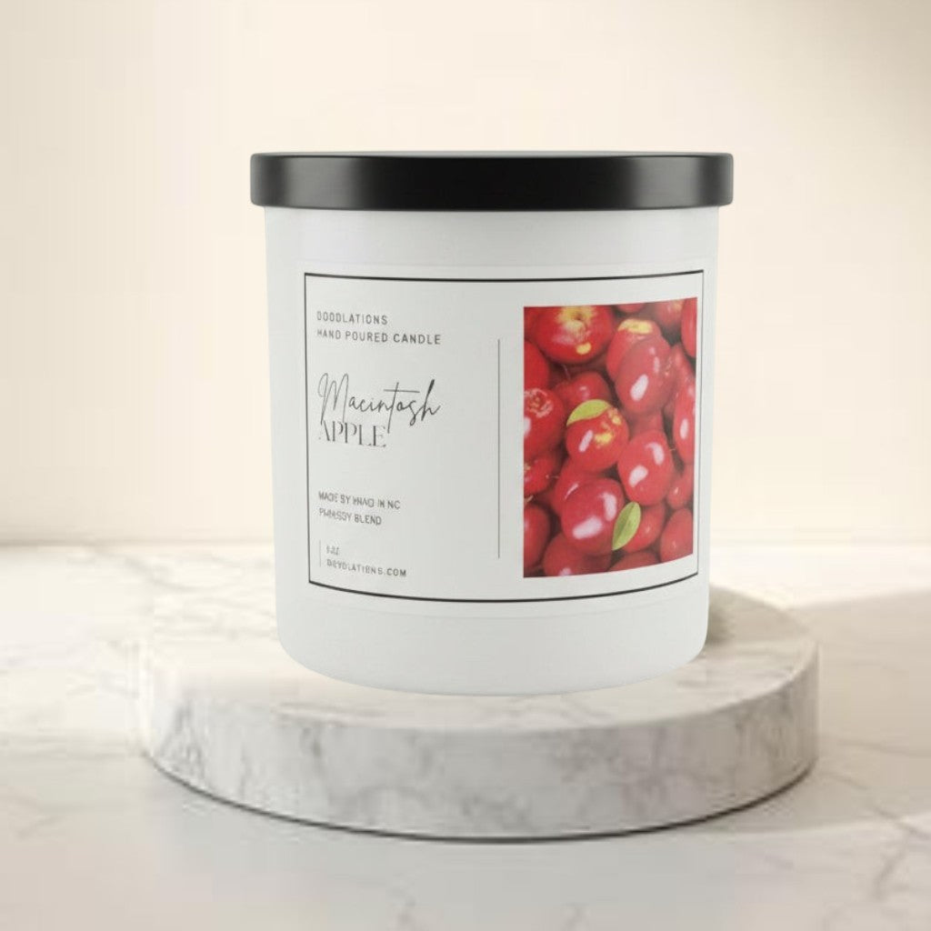 Doodlations Coffee Bar & Boutique Macintosh Apple hand-poured soy blend candle with a crisp apple scent.