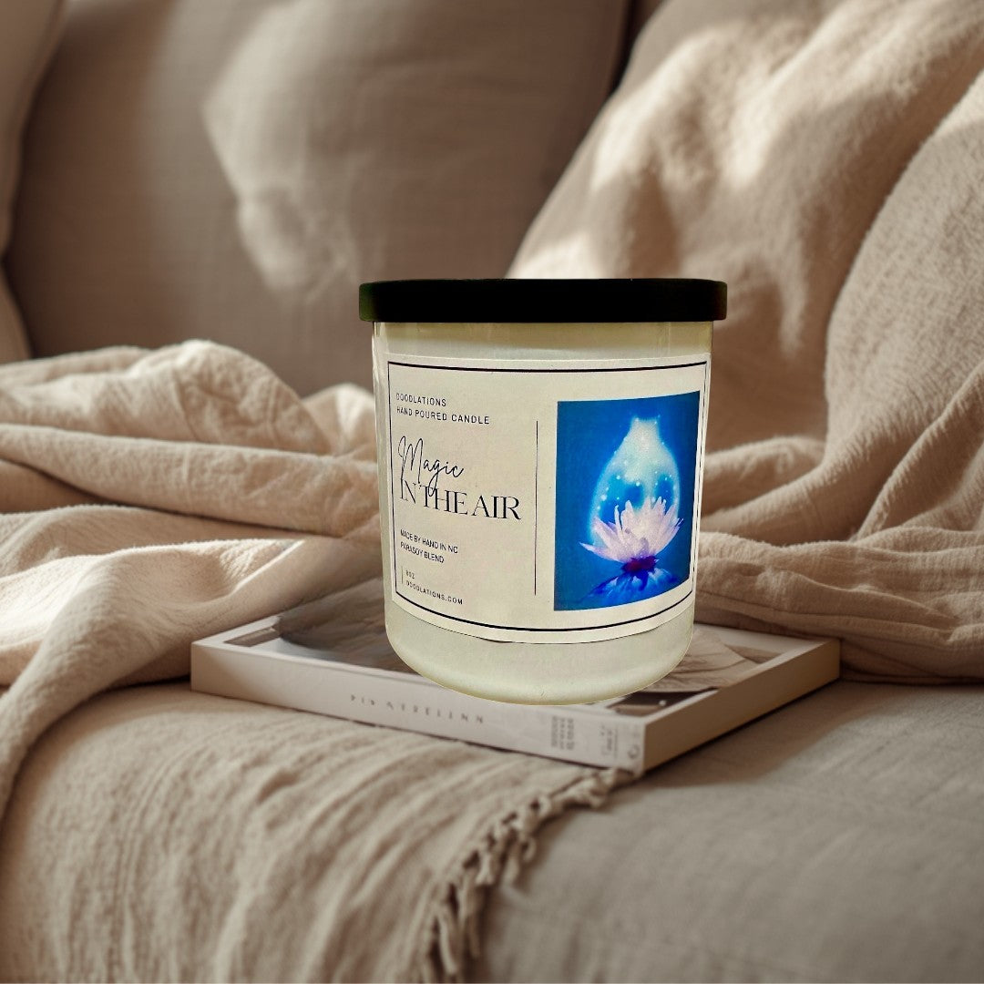 Doodlations Coffee Bar & Boutique Magic in the Air hand-poured soy wax candle with a floral and fruity scent.